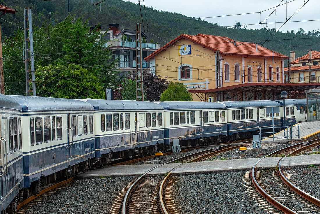 Outisde carriages of Transcantabrico Gran Lujo luxury train travellong across northern Spain, Europe. Journey between Unquera and Cabezon de la Sal.