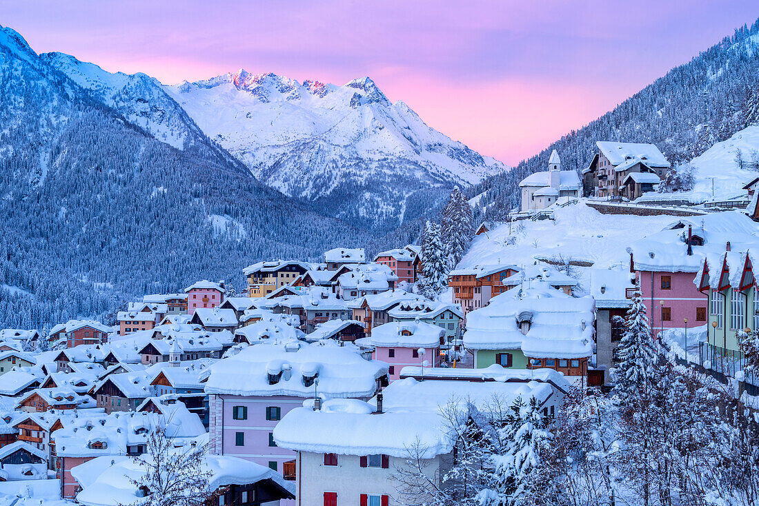 Vermiglio at sunrise in winter season. Europe, Italy, Trentino Alto Adige, Trento province, Sun valley, Vermiglio