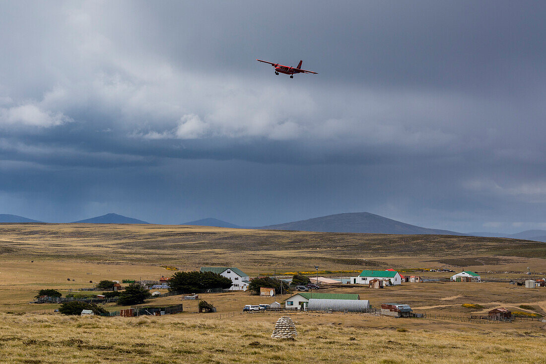 An airplane landing on Pebble Island airstrip. Pebble Island, Falkland Islands