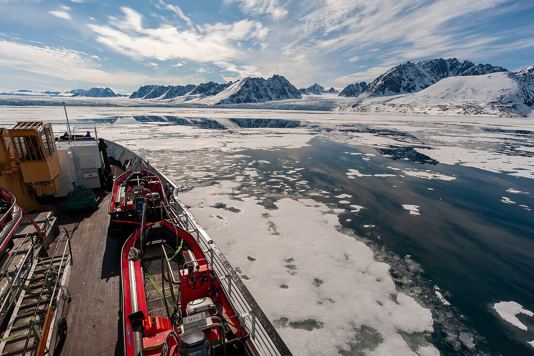The MS Nordstjernen navigates in polar waters off Monaco Glacier. Monaco Glacier, Spitsbergen Island, Svalbard, Norway.