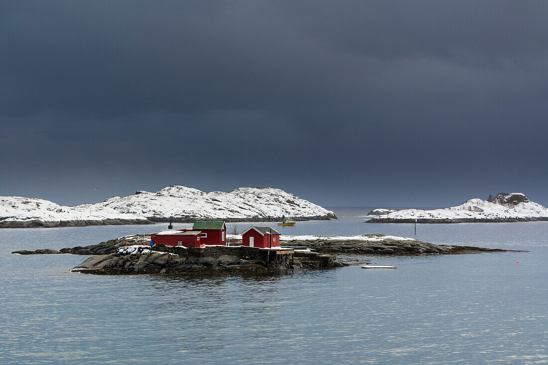 Red huts on a small island in Svolvaer. Svolvaer, Lofoten Islands, Nordland, Norway.
