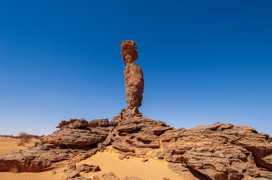 Rock formation called The Finger of Allah. Akakus, Fezzan, Libya.