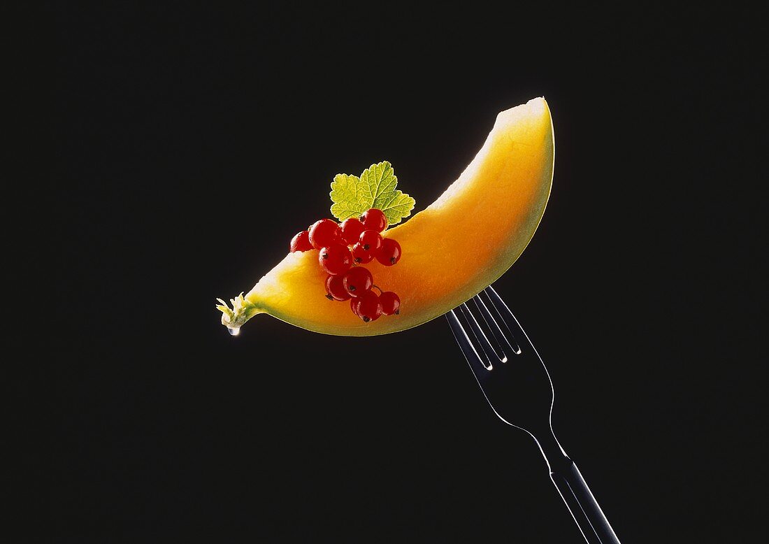 A Slice of Cantaloupe on a Fork