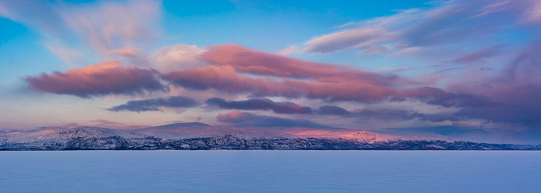 Landscape view of frozen Tornetrask Lake in Abisko National Park, Sweden. Sweden.