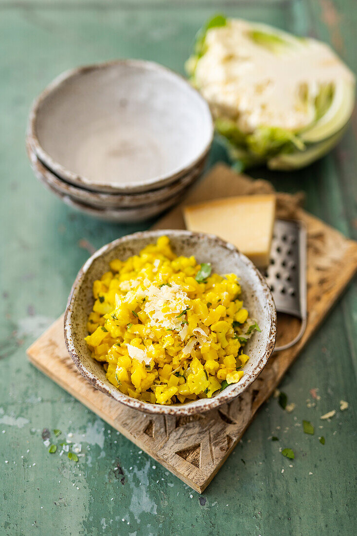 Cauliflower and potato risotto with cashew nuts and parmesan cheese