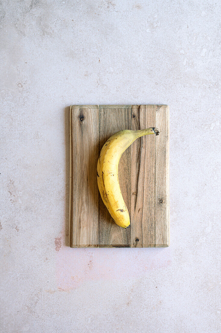 Banana on a cutting board