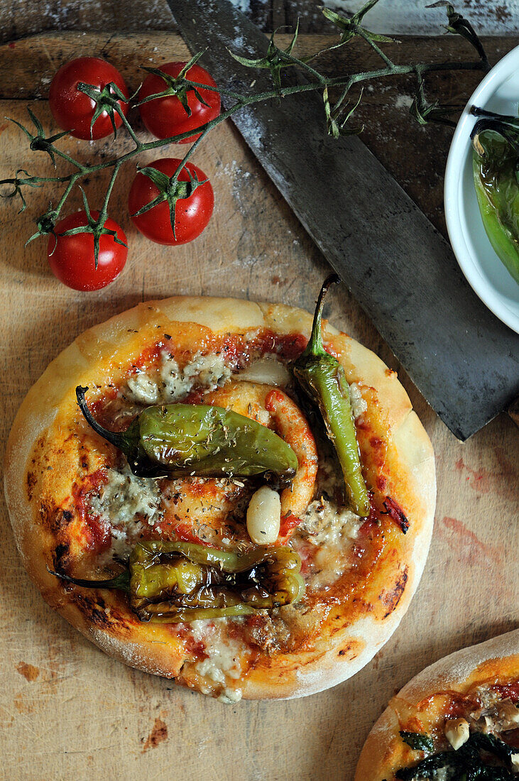 Small pizza with chilli peppers