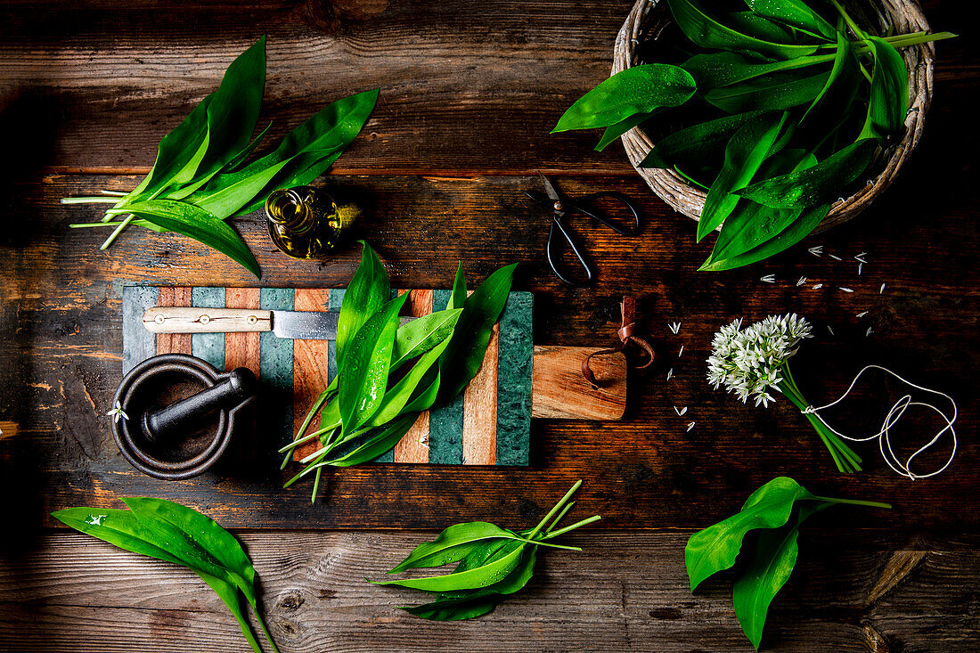 Wild garlic on a rustic wooden background