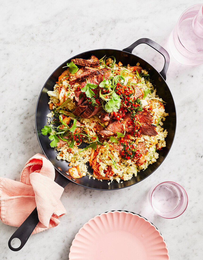 Korean-style lamb with kimchi fried cauliflowe rice