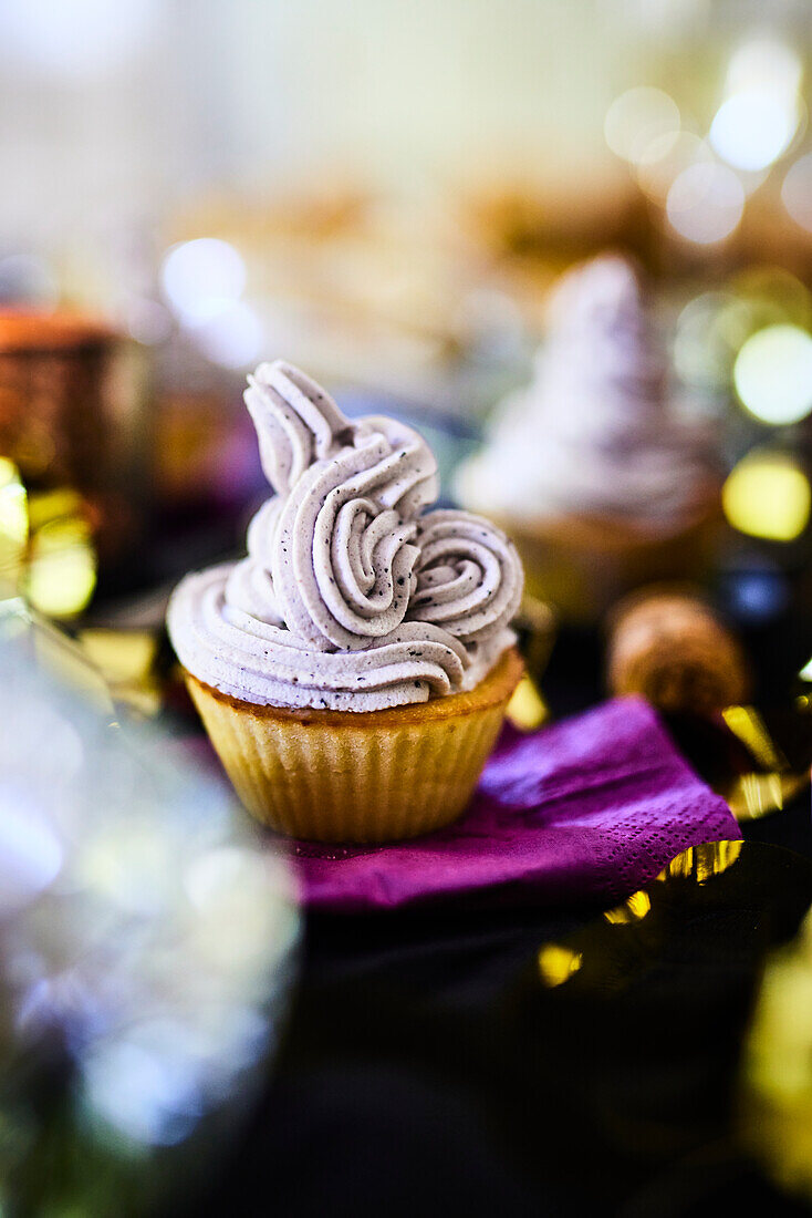 Cupcake with blueberry frosting