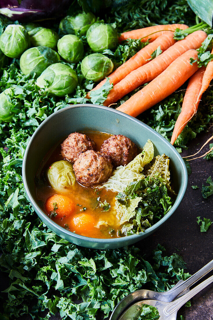 Winter cabbage soup with meatballs
