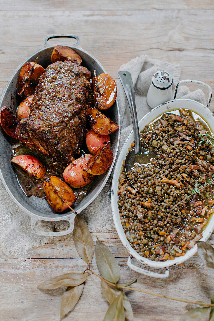 Cider-braised pork with pancetta lentils and apples