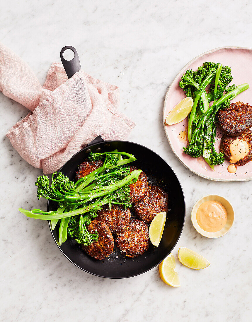 Seeded tuna cakes with broccolini
