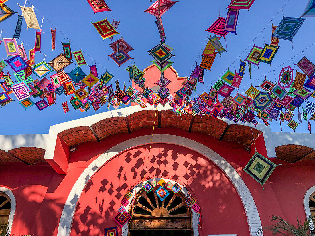 Our Lady of Guadalupe church (Cuasiparroquia de Nuestra Señora de Guadalupe) and Ojo de Dios in Sayulita, Riviera Nayarit, Mexico.