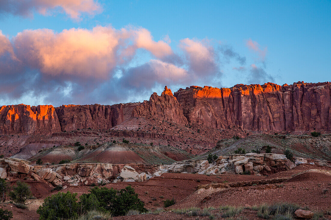 Sunrise light on the sandstone formations of Capitol Reef National Park in Utah.