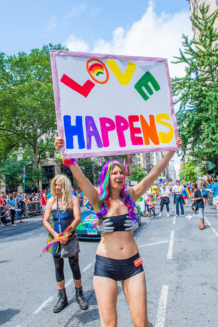 Participants march in the Gay Pride Parade in New York City. The parade is held two days after the U.S. Supreme Court's decision allowing gay marriage in the U.S.