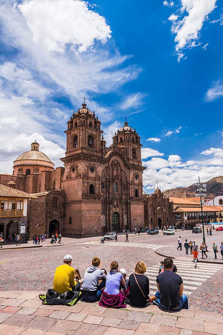 Tourists and Church of the Society of Jesus, Plaza de Armas, Cusco, Peru