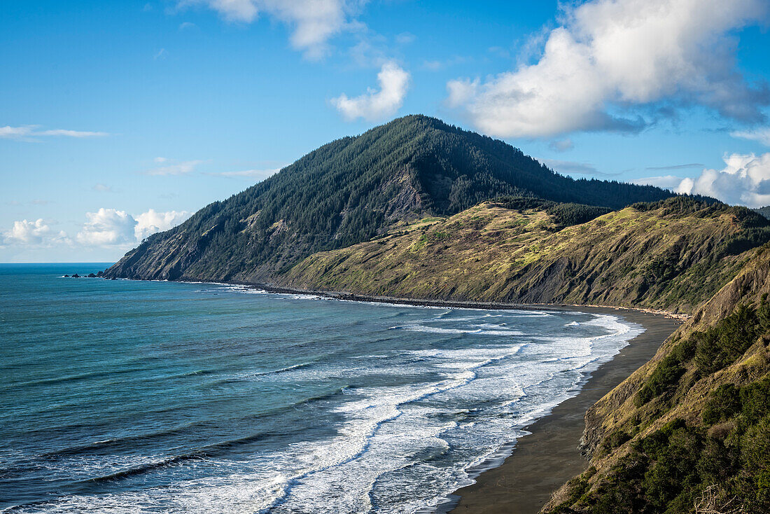 Humbug Mountain and coastline from Highway 101 viewpoint; Humbug Mountain State Park, southern Oregon coast.