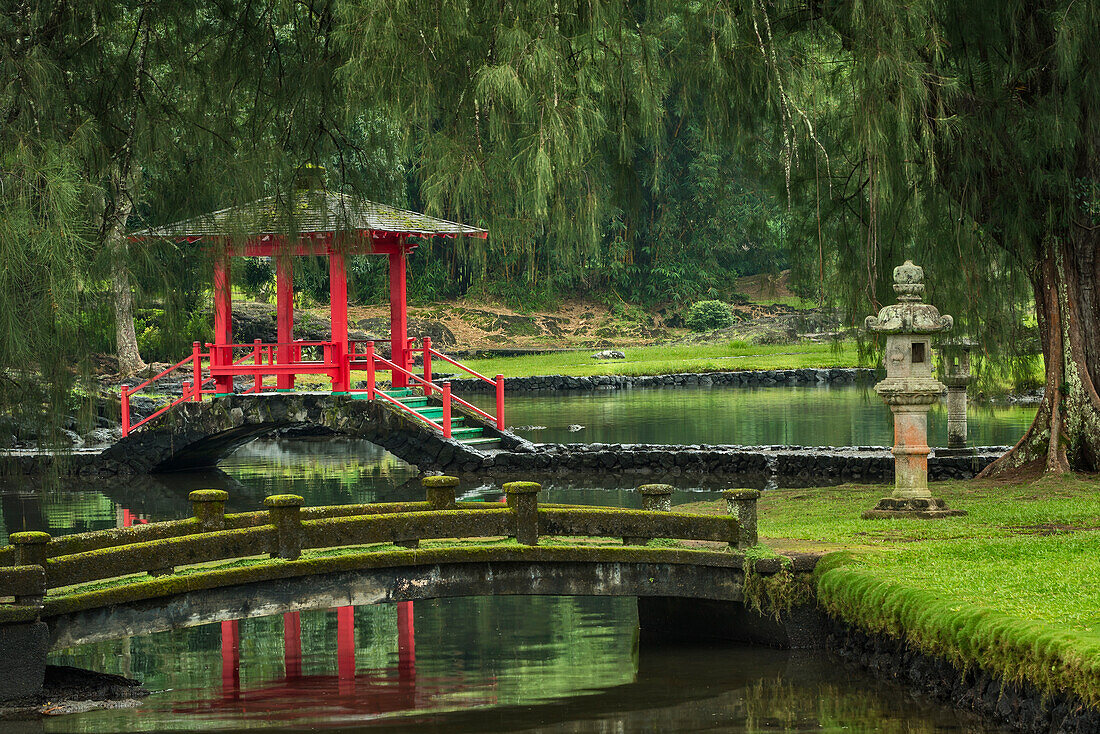 Fishpond, pagoda and bridges in the Japanese Garden of Liliuokalani Gardens in Hilo on the Big Island of Hawaii.