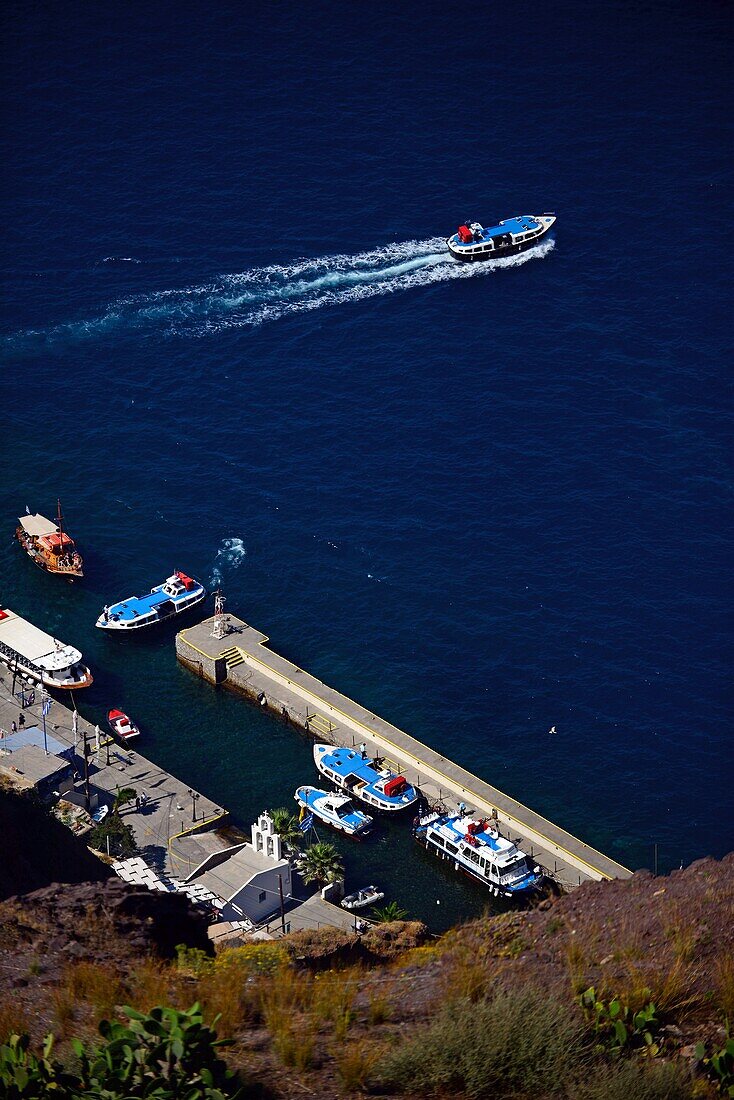 View of dock and boats from above, Fira, Santorini, Greek Islands, Greece