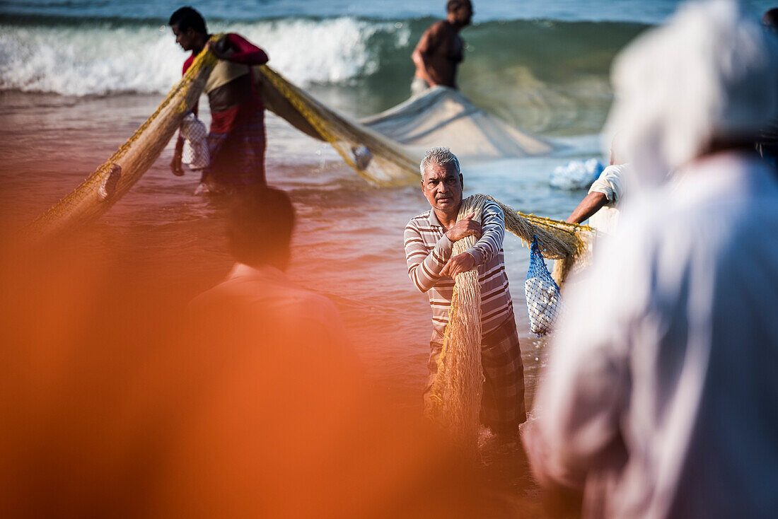 Fishermen at Kappil Beach, Varkala, Kerala, India