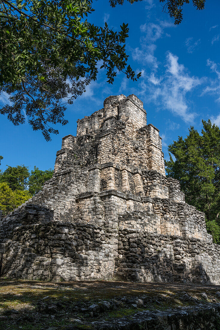 Structure 8I-13, El Castillo or the Castle in the ruins of the Mayan city of Muyil or Chunyaxche in the Sian Ka'an UNESCO World Biosphere Reserve in Quintana Roo, Mexico. At 57 feet or 17 meters in height, it is the tallest pyramid on the north central coast of Quintana Roo.