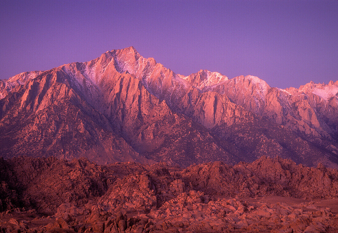 Lone Pine Peak at dawn, with Alabama Hills in the foreground; Sierra Nevada Mountains, California.