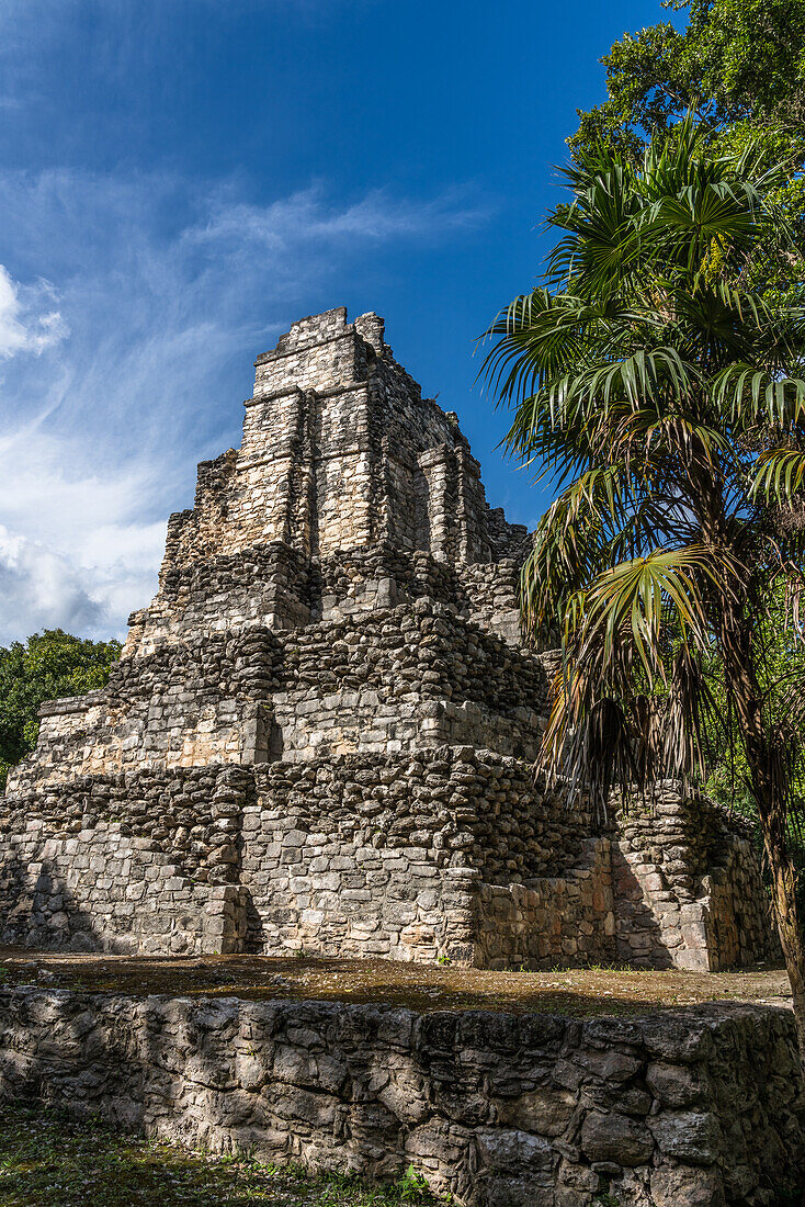 Structure 8I-13, El Castillo or the Castle in the ruins of the Mayan city of Muyil or Chunyaxche in the Sian Ka'an UNESCO World Biosphere Reserve in Quintana Roo, Mexico. At 57 feet or 17 meters in height, it is the tallest pyramid on the north central coast of Quintana Roo.
