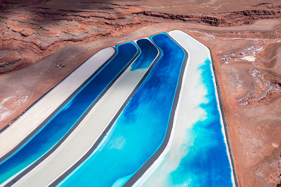 Evaporation ponds at a potash mine using a solution mining method for extracting potash near Moab, Utah. Blue dye is added to speed up evaporation.