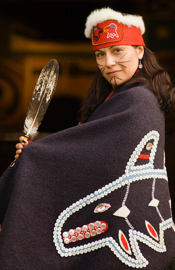 Wilma Leslie, native Alaskan woman of Tlingit and Haida ancestry, wearing traditional Tlingit regalia, at Chief Shakes Island House; Wrangell, Alaska.