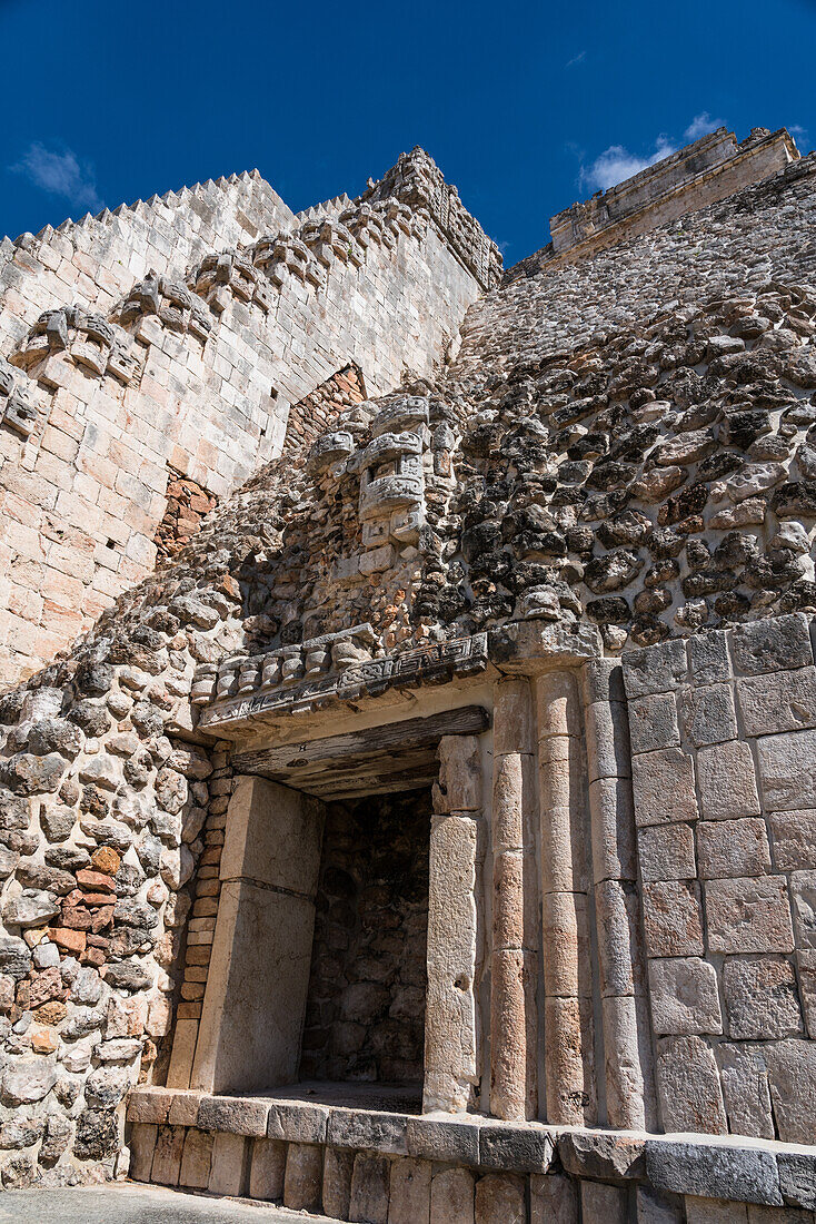 Architectural detail of the Pyramid of the Magician, also known as the Pyramid of the Dwarf, the tallest structure in the pre-Hispanic Mayan ruins of Uxmal, Mexico, rising about 35 meters or 115 feet.