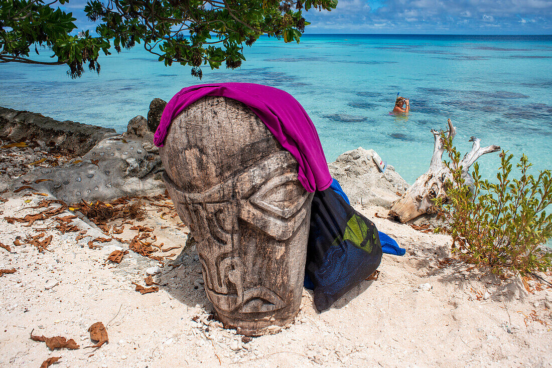 Totem next to the beach in Fakarava, Tuamotus Archipelago French Polynesia, Tuamotu Islands, South Pacific.