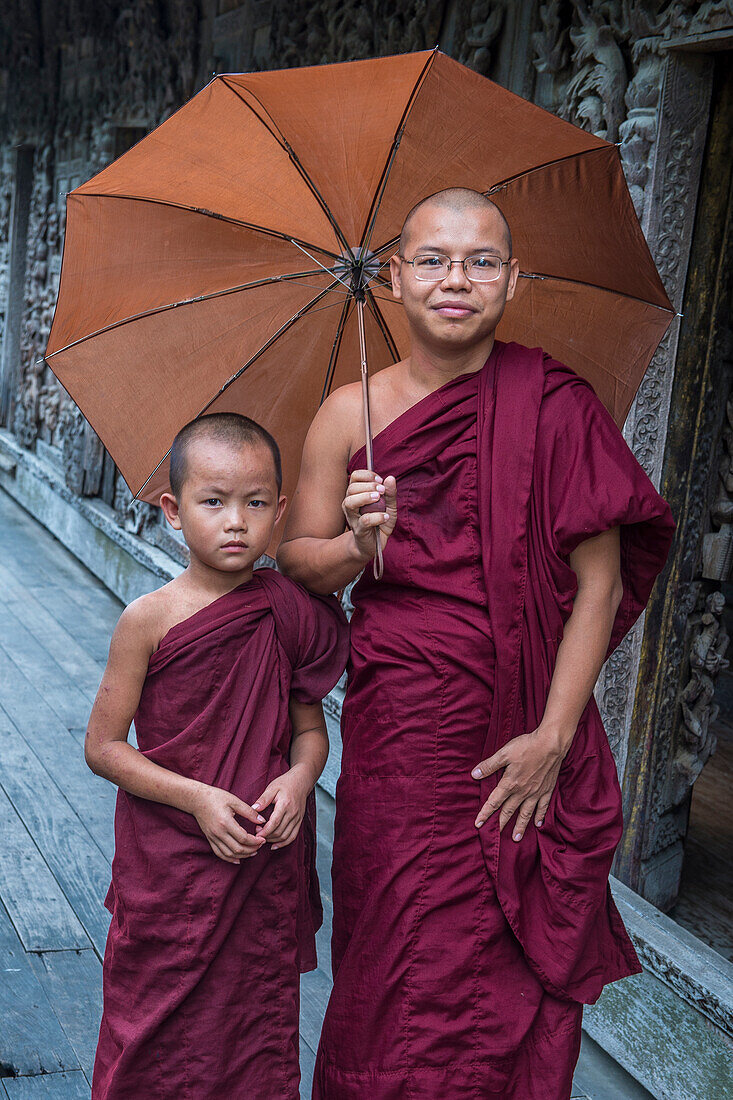 Monks at Shwenandaw Monastery in Mandalay, Myanmar