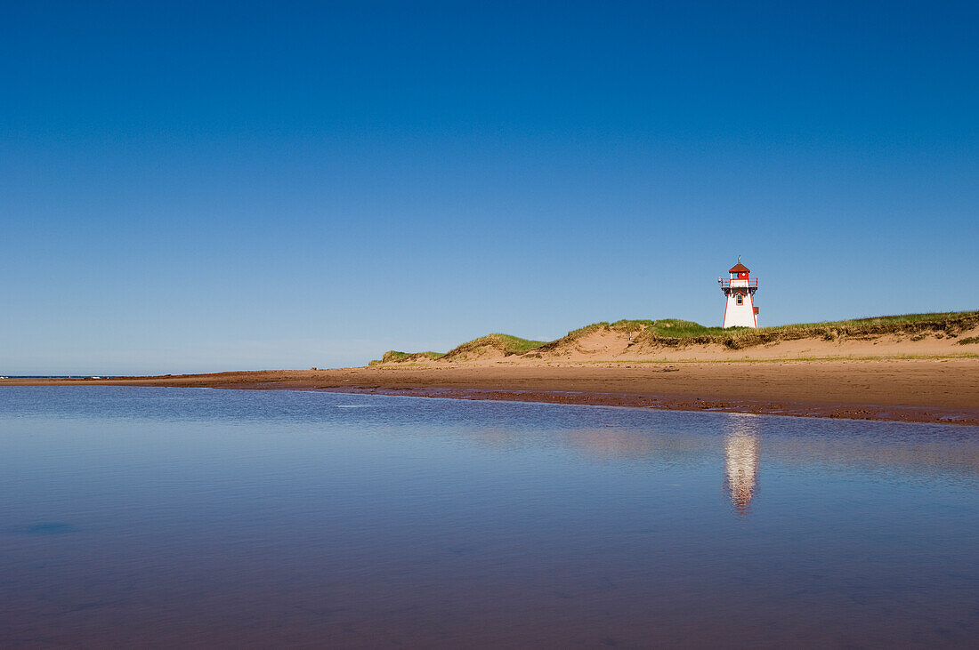 Covehead Lighthouse, beach and sand dunes; Prince Edward Island, Canada.