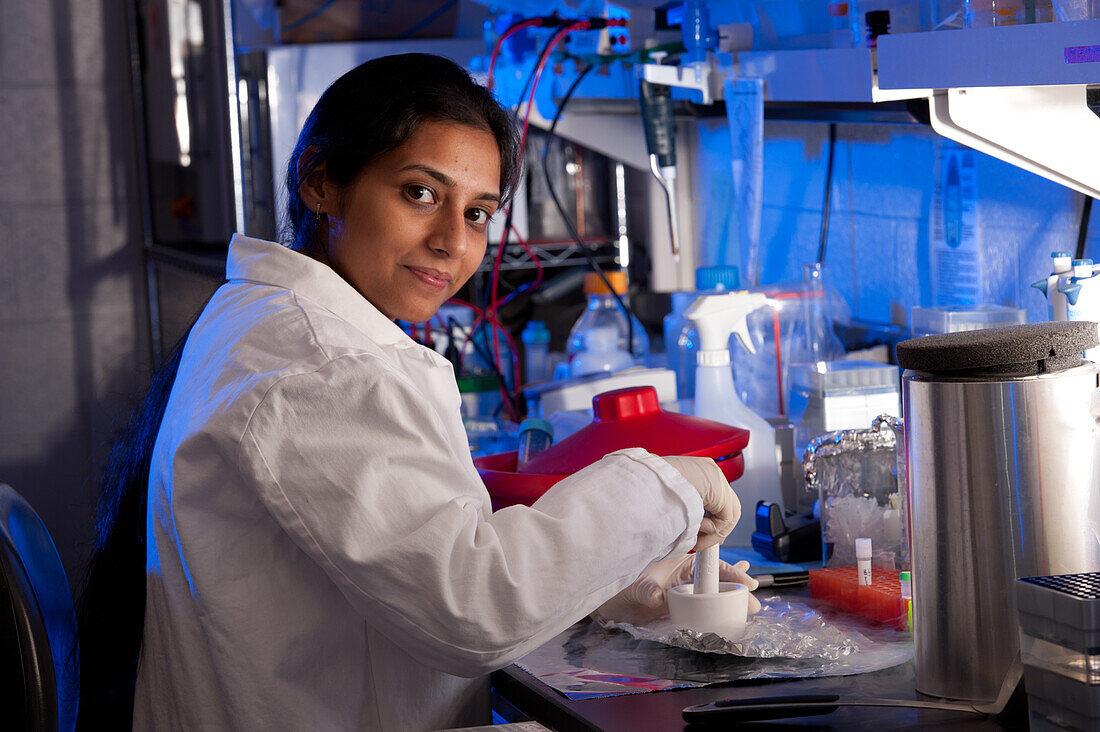 Scientist conducting experiment in lab