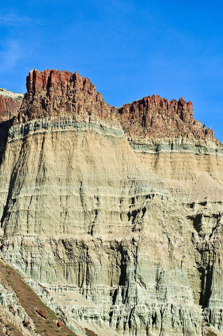 Cathedral Rock, an eroded formation of volcanic tuff capped with basalt in the Sheep Rock Unit of John Day Fossil Beds National Monument, Oregon.