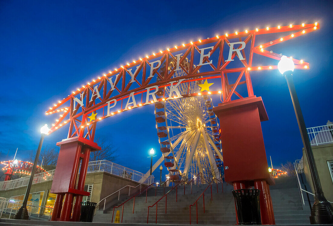 The Navy pier in Chicago , The Navy pier built in 1916 as 3300 foot pier for tour and excursion boats and it's one of Chicago's tourist attraction.