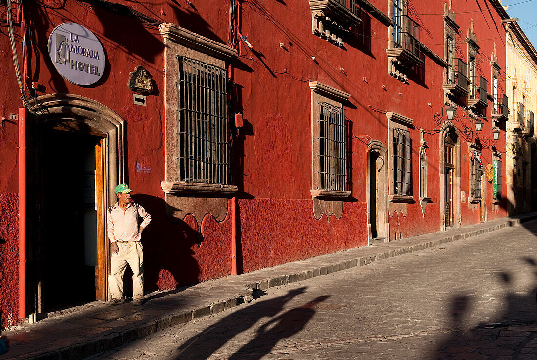 Man in doorway of La Morada Hotel in San Miguel de Allende, Mexico.