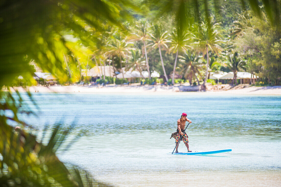 Paddleboarding in Muri Lagoon, Rarotonga, Cook Islands