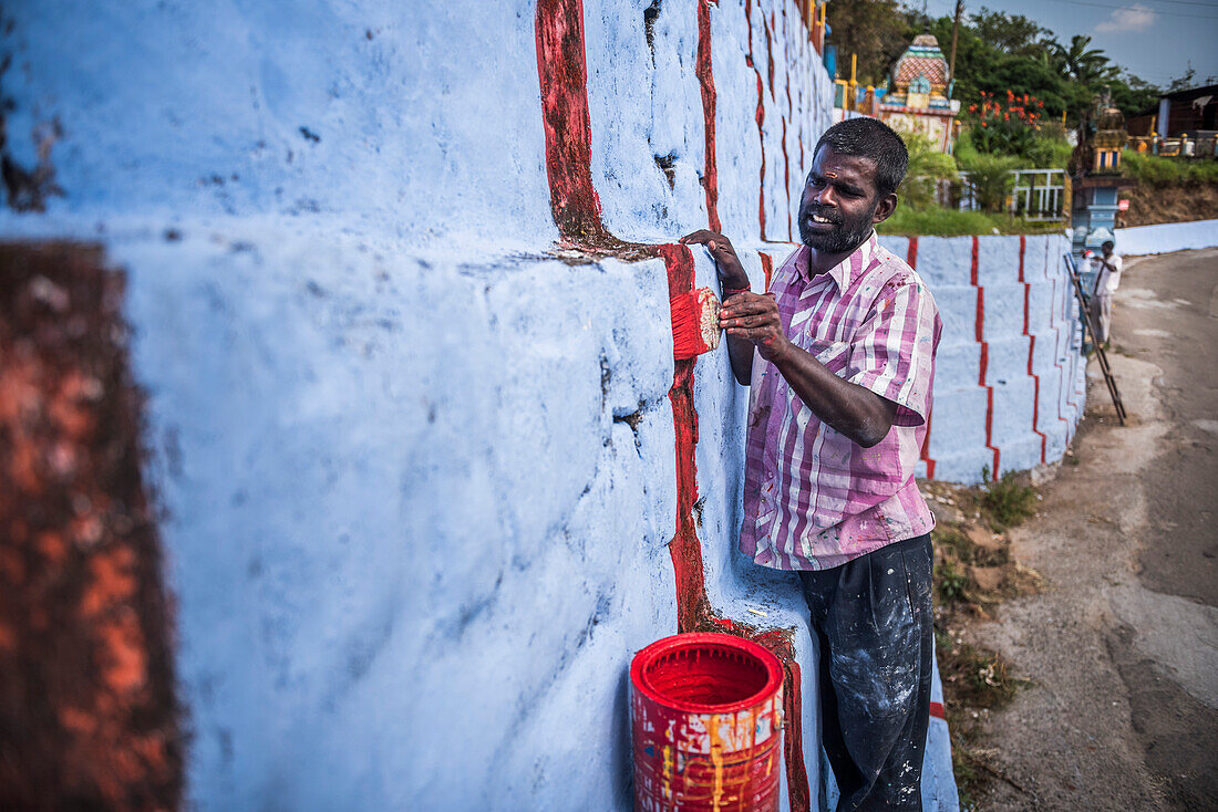 Repainting Sri Subramaniya Swamy Hindu Temple blue, Munnar, Western Ghats Mountains, Kerala, India