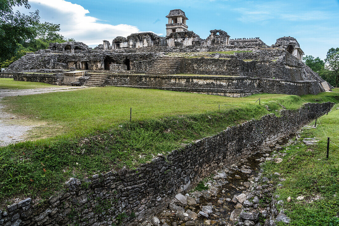 The Palace and the aqueduct in the ruins of the Mayan city of Palenque, Palenque National Park, Chiapas, Mexico. A UNESCO World Heritage Site.