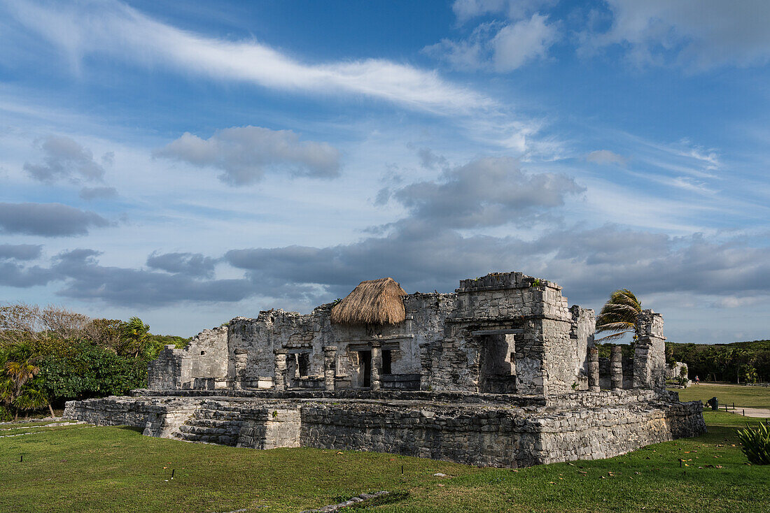 The Palace of the Halach Uinic or Great Lord in the ruins of the Mayan city of Tulum on the coast of the Caribbean Sea. Tulum National Park, Quintana Roo, Mexico.