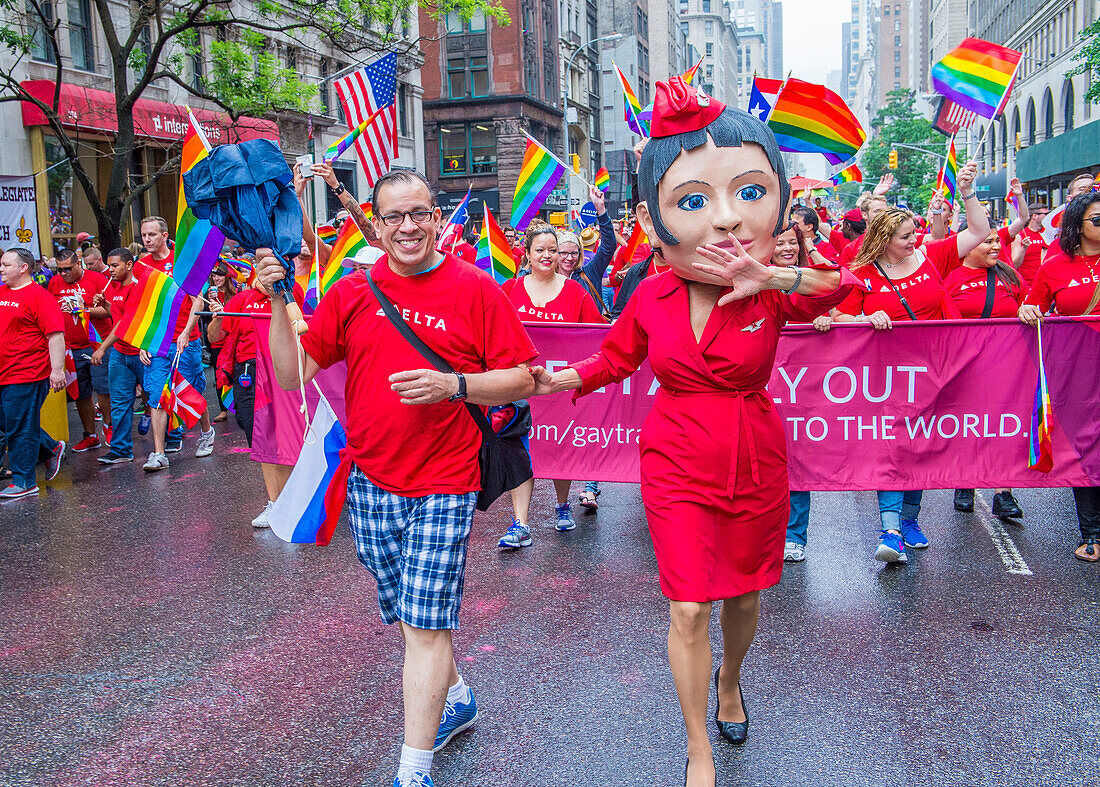 Participants march in the Gay Pride Parade in New York City. The parade is held two days after the U.S. Supreme Court's decision allowing gay marriage in the U.S.