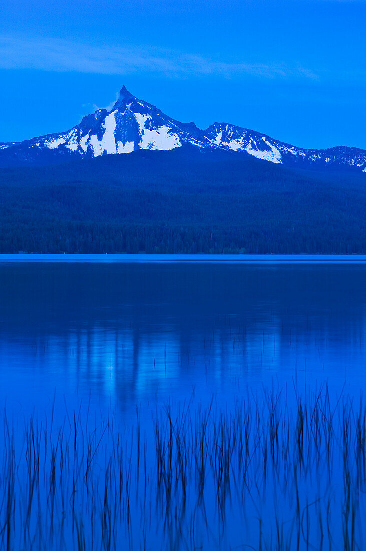 Mount Thielsen and Diamond Lake at dawn, Cascade Mountains, Oregon.