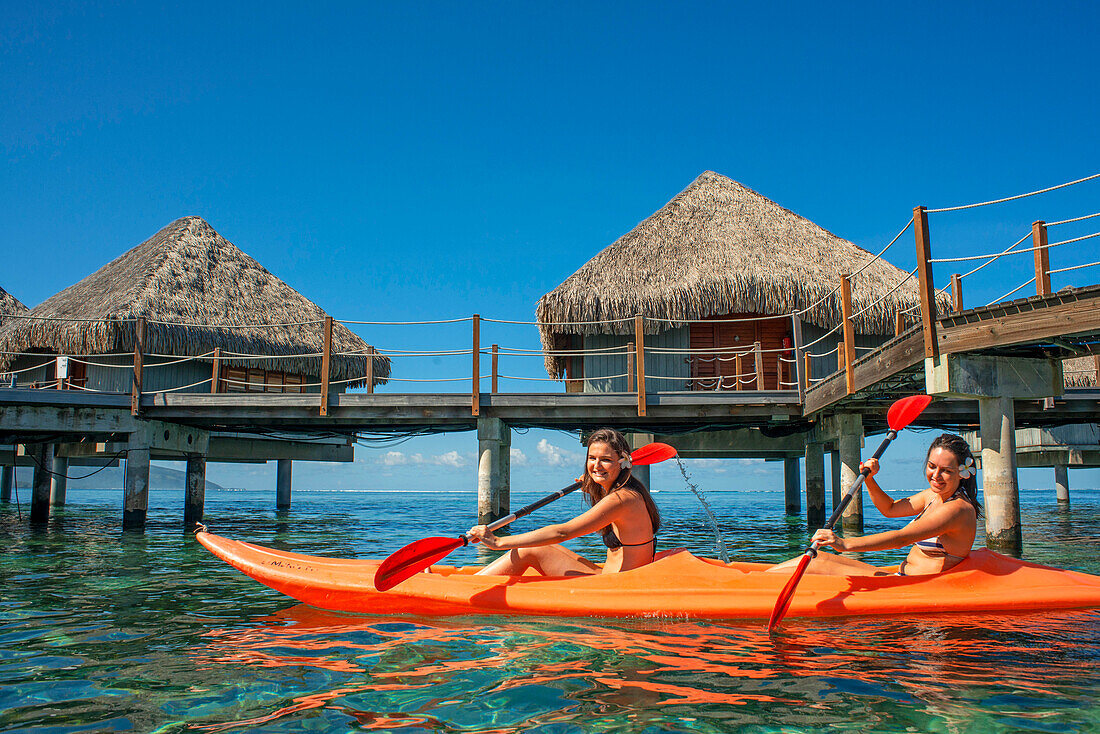 Kayaking in front Le Meridien Hotel on the island of Tahiti, French Polynesia, Tahiti Nui, Society Islands, French Polynesia, South Pacific.