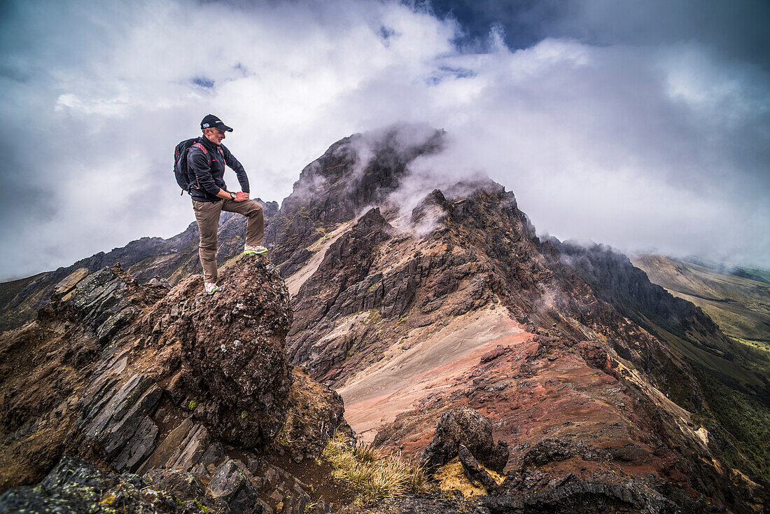 Climber on Ruminahui Volcano summit, Cotopaxi National Park, Avenue of Volcanoes, Ecuador