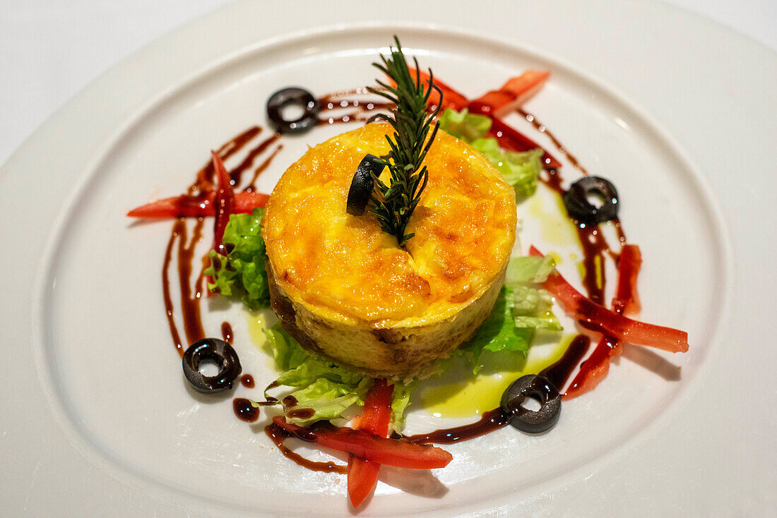 One of the dish of Stefan Berndt, the executive chef of Paul Gauguin show some dishes of the restaurant, 2-star Michelin. Paul Gauguin cruise, Society Islands, Tuamotus Archipelago, French Polynesia, South Pacific.