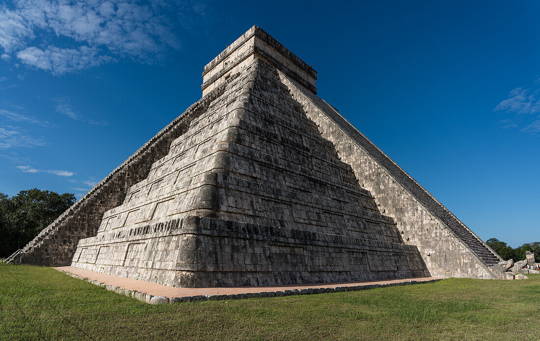 El Castillo or the Temple of Kukulkan is the largest pyramid in the ruins of the great Mayan city of Chichen Itza, Yucatan, Mexico. The Pre-Hispanic City of Chichen-Itza is a UNESCO World Heritage Site.