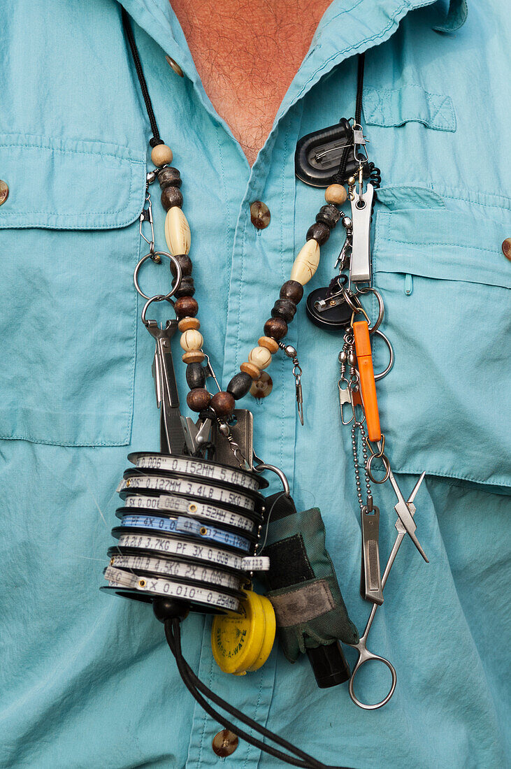 Fly fishing gear worn by guide Russell Moore from The Kingfisher Flyshop in Missoula, Montana, while floating the Blackfoot River.