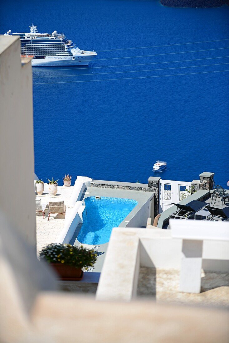 Building roofs and cruise ships in Fira, Santorini, Greek Islands, Greece